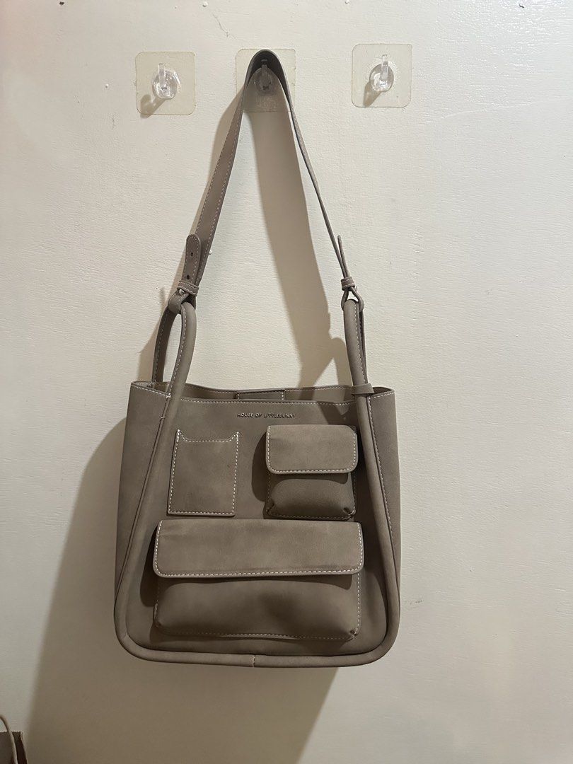 preloved - holb momentum journey tan (Category: Shoulder Bags) located in Manila. Submitted by siesells (Listing ID 1465725722, Image 1). Description: only issue: - added a button hole to make strap shorter using proper tool - still good looking.