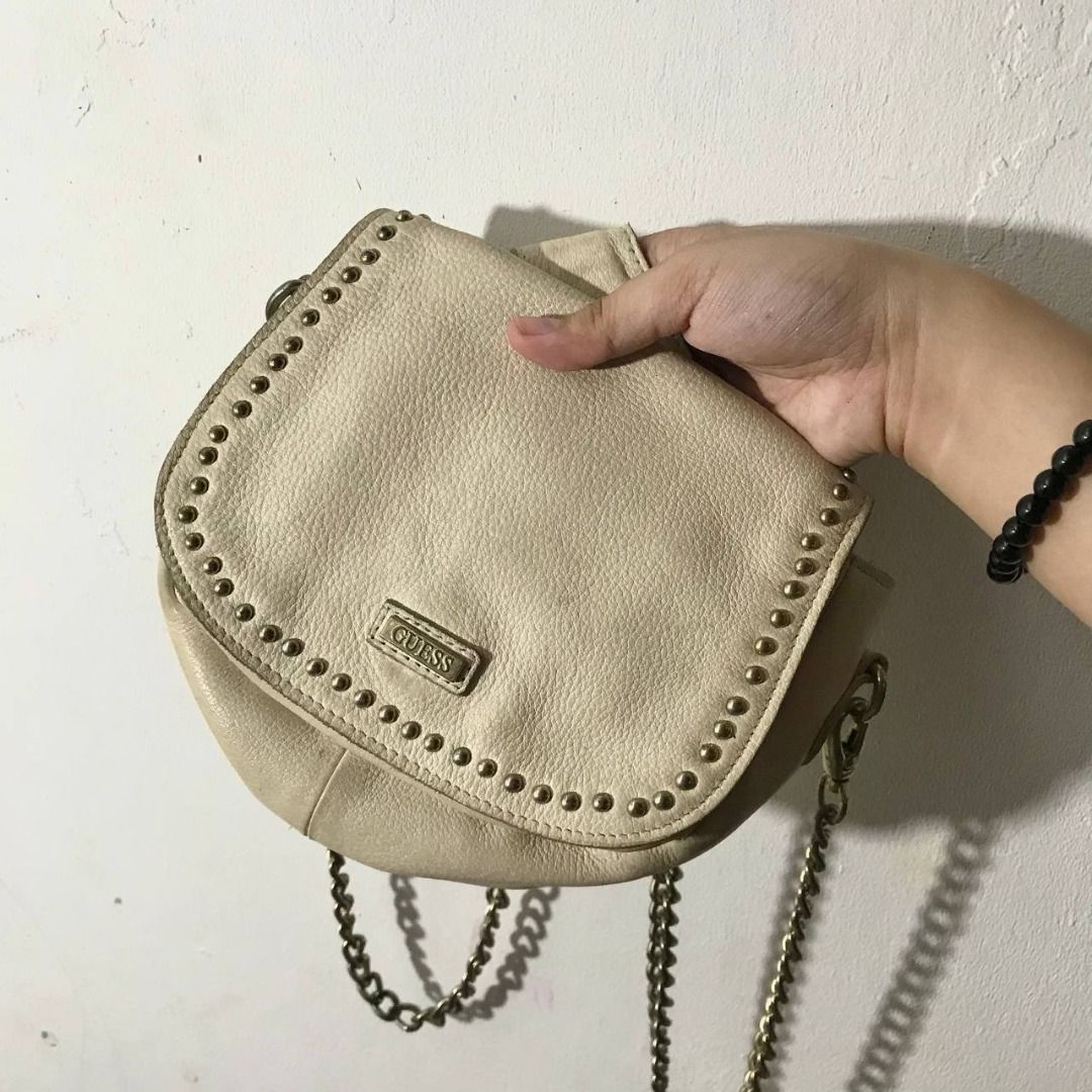 preloved bags (Category: Luxury Bags & Wallets) located in Quezon City. Submitted by klunaln (Listing ID 1465751691, Image 3). Description: guess sling bag cream 🧺 1,300 - need cleaning also - medyo nag tarnish or fade lang yung sa sling na gold hot pink coach bag 🧺 1,500 - no issues & all working - need cleaning only - large capacity kasya laptop & ipad naraya bag leopard creme (large capacity) 🧺 1,000 - no issues & all working - need cleanin