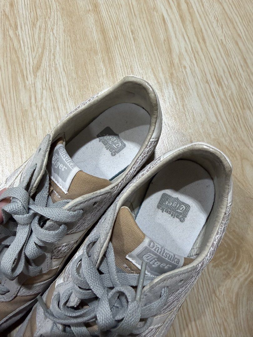 Preloved Authentic Onitsuka Tiger Serrano US 7.5/EU 39 (Category: Sneakers) located in Binan City. Submitted by ownmystuff (Listing ID 1465615948, Image 2). Description: Preloved Onitsuka Tiger sneakers in a neutral beige and gray colorway. Perfect for everyday wear and easy to pair with any outfit! * Brand: Onitsuka Tiger * Model: Serrano (D884L) * Color: Beige / Gray * Size: US 7.5 / EU 39 * Made in: Vietnam * Condition: Preloved * Bought in Ca