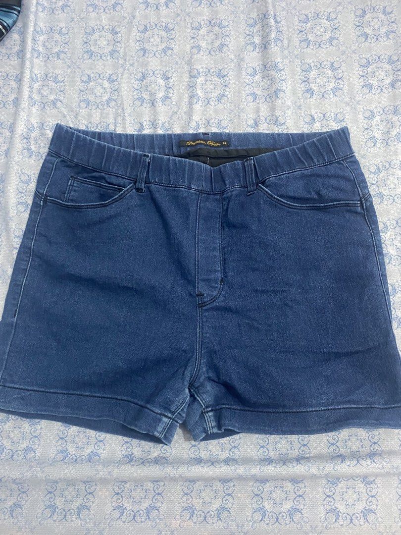 Premium Basic Denim Shorts Size 31 (Category: Shorts) located in Manila. Submitted by cjareenah (Listing ID 1465625601, Image 1). Description: - Brand: Premium Basic - Size: 31 (indicated on inner tag) - Color/Wash: Dark wash denim with stretch - Waist: Elastic waistband with belt loops - Pockets: Two front pockets, two back patch pockets - Details: Faux fly stitching, rolled cuffs at hem Mop: Gcash Mop: J&T (sf will be shouldered by buyer).