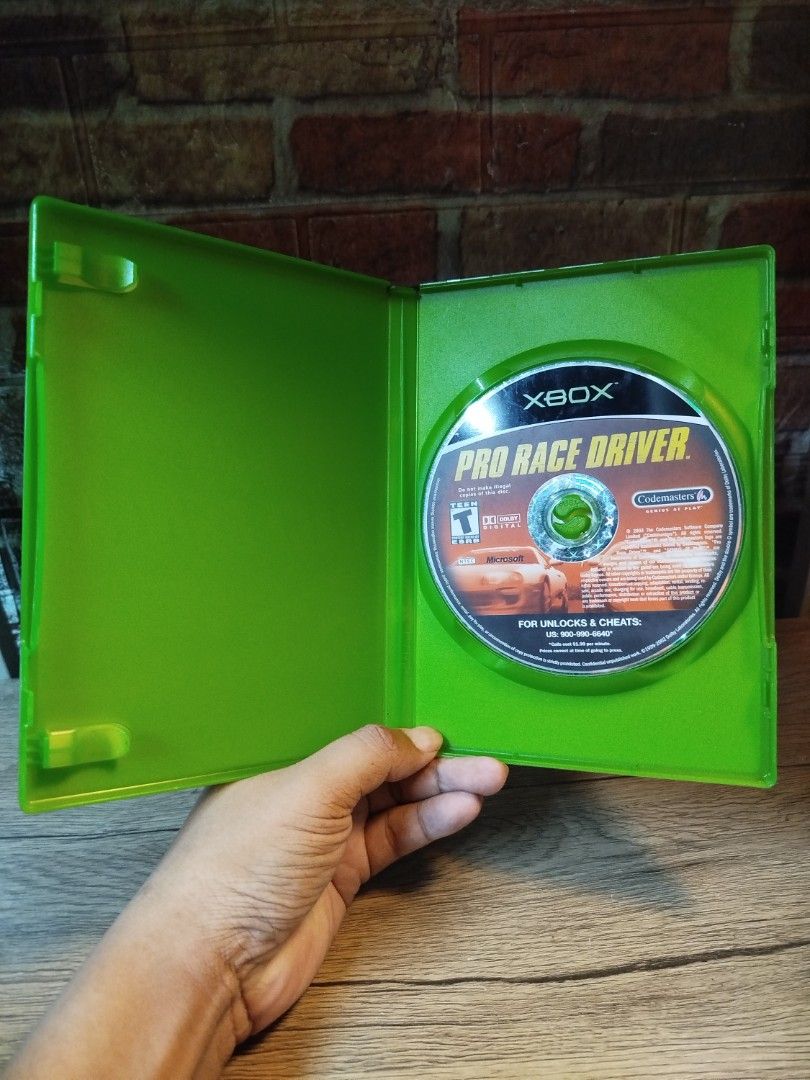 Pro Race Driver Xbox Game Codemasters (Category: Xbox) located in Binan City. Submitted by pumpkiiin02 (Listing ID 1465749945, Image 3). Description: - Title: Pro Race Driver - Platform: Original Xbox - Developer: Codemasters - Rating: Teen (mild violence, strong language) - Condition: Tested and ready to play, includes original green case and game disc - Ideal for: Racing fans and retro game collectors.