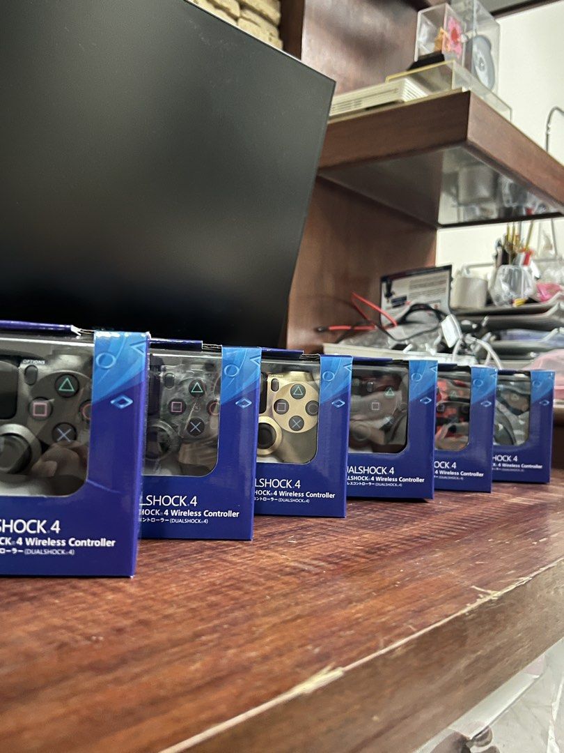 Ps4 Wireless Controller (Category: Controllers) located in Singapore. Submitted by ps4controllershub (Listing ID 1465635390, Image 1). Description: North area meet up. All colours are available. Buy 1 for $20, 2 for $36 (Brand New, Cable included) Trusted seller for 2 years and counting Available colours - Transparent Red - ⁠Transparent Blue - ⁠Transparent Clear - ⁠Camo Red - ⁠Camo Blue - ⁠Camo Green - ⁠Gold - ⁠Dark Grey Self collect at Semb Mrt 