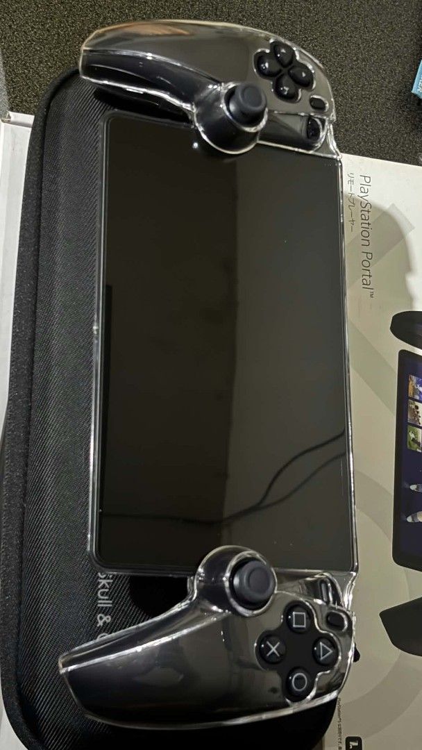 PS Portal - Midnight Black (Category: PlayStation) located in Paranaque City. Submitted by fayenaagas (Listing ID 1465722872, Image 3). Description: Details 1. No dents 2. No hidden issues 3. 100% smooth 4. With Crystal clear case and skull and co carrying case Can do meet up, in Makati or Parañaque. Shipping will be shouldered by the buyer. .