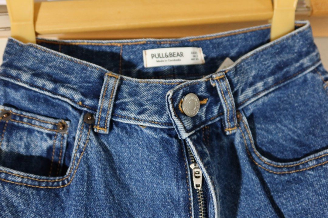 Pull&Bear High-Waist Denim Jeans (Category: Jeans) located in Cabanatuan. Submitted by jstne_ (Listing ID 1465610512, Image 2). Description: ₱600 Each ₱1000 for 2pcs - Brand: Pull&Bear - Style: High-waisted straight leg denim jeans - Color: Classic dark blue wash with stylish contrast stitching - Details: Button fly closure, functional front and back pockets, and leather patch on the back waistband - Fit: Flattering, versatile wardrobe staple per