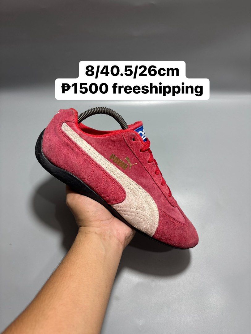 Puma Sparco Red Suede Sneakers Size US 8 (Category: Sneakers) located in Butuan. Submitted by shoeetasho (Listing ID 1465757249, Image 1). Description: - Brand: Puma x Sparco - Style: Motorsport sneakers / Driving shoes - Color: Red suede with white formstrip, blue tongue branding, and gold Puma cat logo - Size: US 8 / EUR 40.5 / 26cm - Condition: Clean uppers with solid rubber outsoles - Fit: Comfortable low-profile design ideal for driving or s