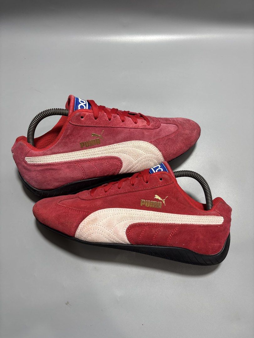 Puma Sparco Red Suede Sneakers Size US 8 (Category: Sneakers) located in Butuan. Submitted by shoeetasho (Listing ID 1465757249, Image 3). Description: - Brand: Puma x Sparco - Style: Motorsport sneakers / Driving shoes - Color: Red suede with white formstrip, blue tongue branding, and gold Puma cat logo - Size: US 8 / EUR 40.5 / 26cm - Condition: Clean uppers with solid rubber outsoles - Fit: Comfortable low-profile design ideal for driving or s