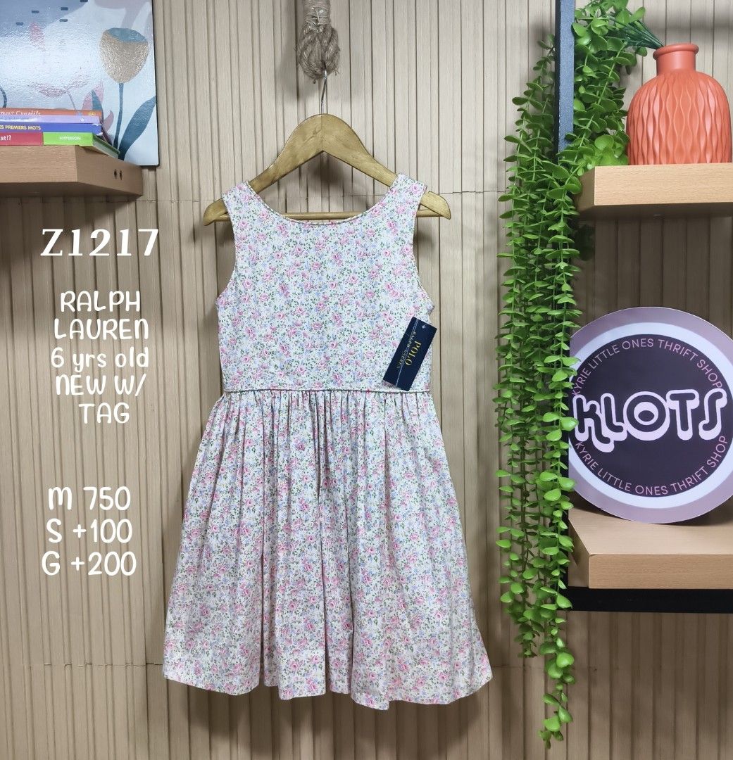 Ralph Lauren Floral Dress (Category: Babies & Kids Fashion) located in Quezon City. Submitted by christinejoycheng1 (Listing ID 1465736596, Image 1). Description: - Brand: Ralph Lauren - Condition: Brand new with original store tags attached - Design: Pink floral print, sleeveless, fitted bodice, and flared skirt - Details: Back button closure, complete with white inner lining - Material: 100% premium cotton (lightweight and breathable) - Style: 