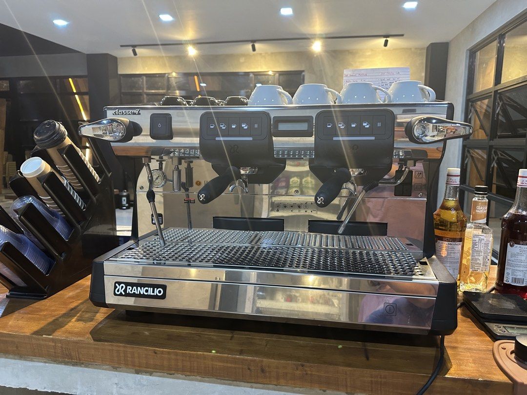 Rancilio Classe 7 Espresso Machine (Category: Coffee Machines & Makers) located in Cagayan de Oro. Submitted by missyfairy789 (Listing ID 1465589616, Image 1). Description: - Brand/Model: Rancilio Classe 7 Commercial 2-Group Espresso Machine - Material: Durable stainless steel finish - Included: Dual portafilters and steam wands on both sides - Features: Built-in cup warmer rail on top - Condition: Extracted from an active cafe setup, works great