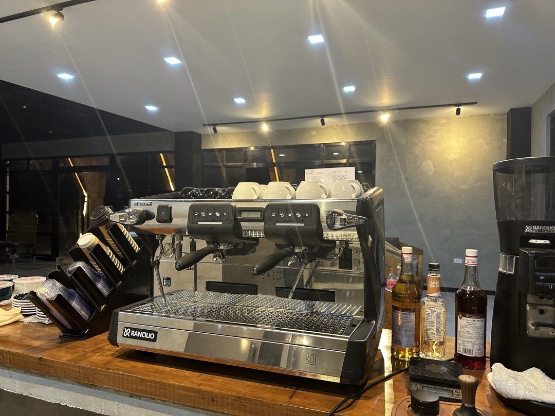 Rancilio Classe 7 Espresso Machine (Category: Coffee Machines & Makers) located in Cagayan de Oro. Submitted by missyfairy789 (Listing ID 1465589616, Image 2). Description: - Brand/Model: Rancilio Classe 7 Commercial 2-Group Espresso Machine - Material: Durable stainless steel finish - Included: Dual portafilters and steam wands on both sides - Features: Built-in cup warmer rail on top - Condition: Extracted from an active cafe setup, works great