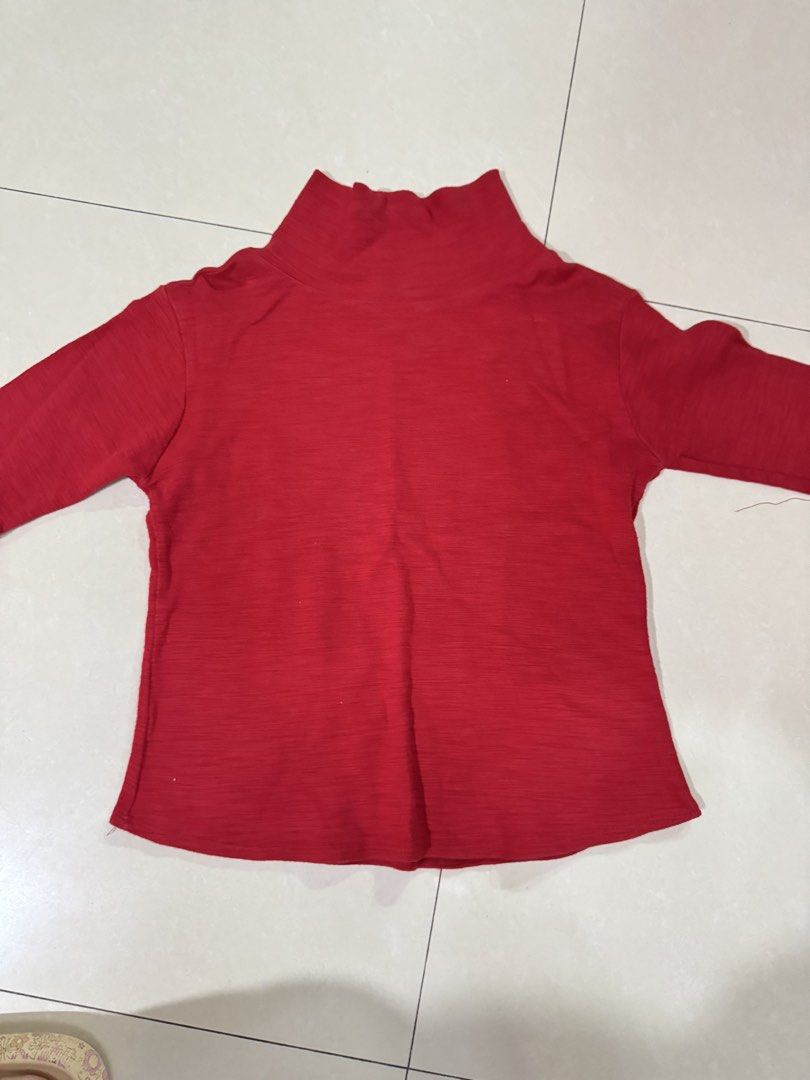 Red Turtleneck Top Mock Neck Long Sleeve Sweater (Category: Longsleeves) located in Quezon City. Submitted by sweetlyluxe (Listing ID 1465601847, Image 2). Description: - Color: Bright red - Style: Half-sleeve turtleneck with high mock neck - Material: Cozy ribbed knit texture - Features: Great layering piece for cooler weather, winter, office - Versatility: Easy to match with jeans or skirts.