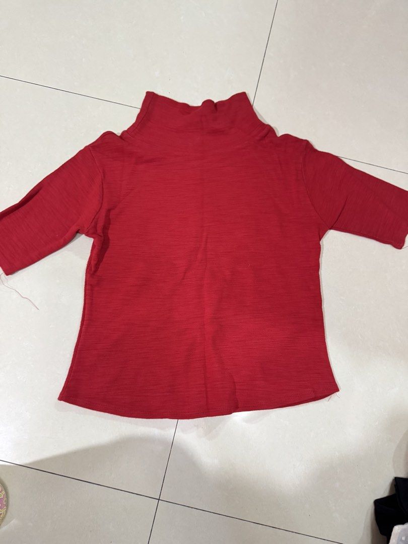 Red Turtleneck Top Mock Neck Long Sleeve Sweater (Category: Longsleeves) located in Quezon City. Submitted by sweetlyluxe (Listing ID 1465601847, Image 1). Description: - Color: Bright red - Style: Half-sleeve turtleneck with high mock neck - Material: Cozy ribbed knit texture - Features: Great layering piece for cooler weather, winter, office - Versatility: Easy to match with jeans or skirts.