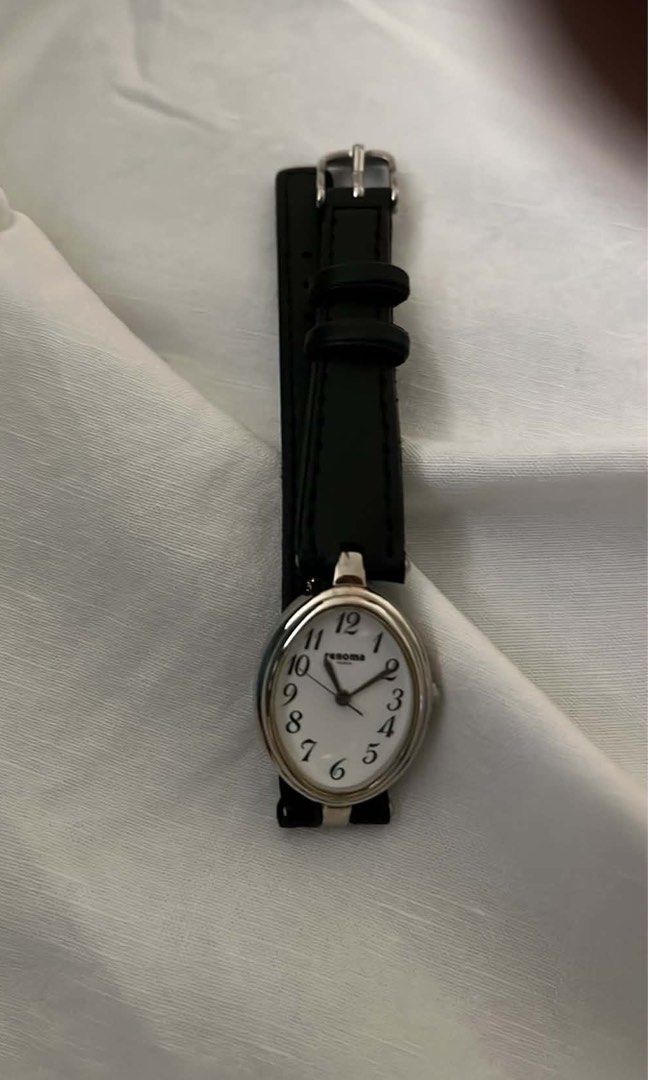 Renoma Paris Oval Wristwatch Black Leather Strap (Category: Women's Watches) located in Manila. Submitted by er.rxr (Listing ID 1465604113, Image 2). Description: - authentic (Japan luxury auction) - working battery and no damages or issues - 9/10 condition.