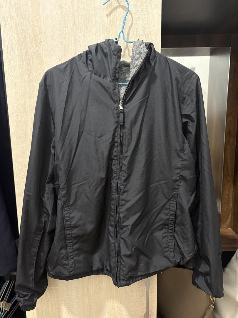 Reversible Black and Grey Hooded Jacket (Category: Coats, Jackets and Outerwear) located in Pasig City. Submitted by munchinitajanella (Listing ID 1465616922, Image 1). Description: Versatile reversible jacket with a smooth black outer shell and a soft grey marled fabric lining. Includes a full zip front, attached hood, and front pockets. Wear it either way depending on the weather or outfit. Great layering piece for breezy days, workouts, or cas