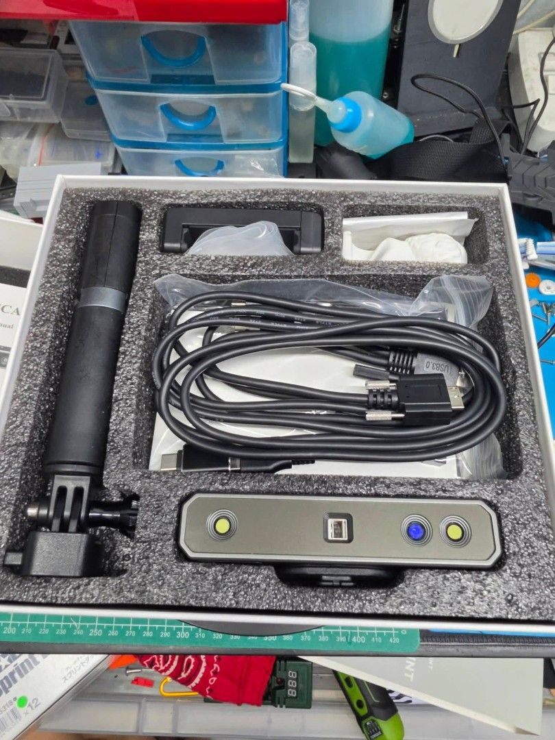 Revopoint Mini 3D Scanner (Category: Printers, Scanners & Copiers) located in Taguig. Submitted by sheila_cv (Listing ID 1465587223, Image 2). Description: PRICE IS NEGO - Item: Revopoint Mini 3D Scanner Kit - Condition: Complete with original packaging foam insert and box - Inclusions: Scanner unit, tripod stand, and all original cables - Ideal Use: High-precision scanning for small objects, miniatures, and detailed parts - Status: Ready for you