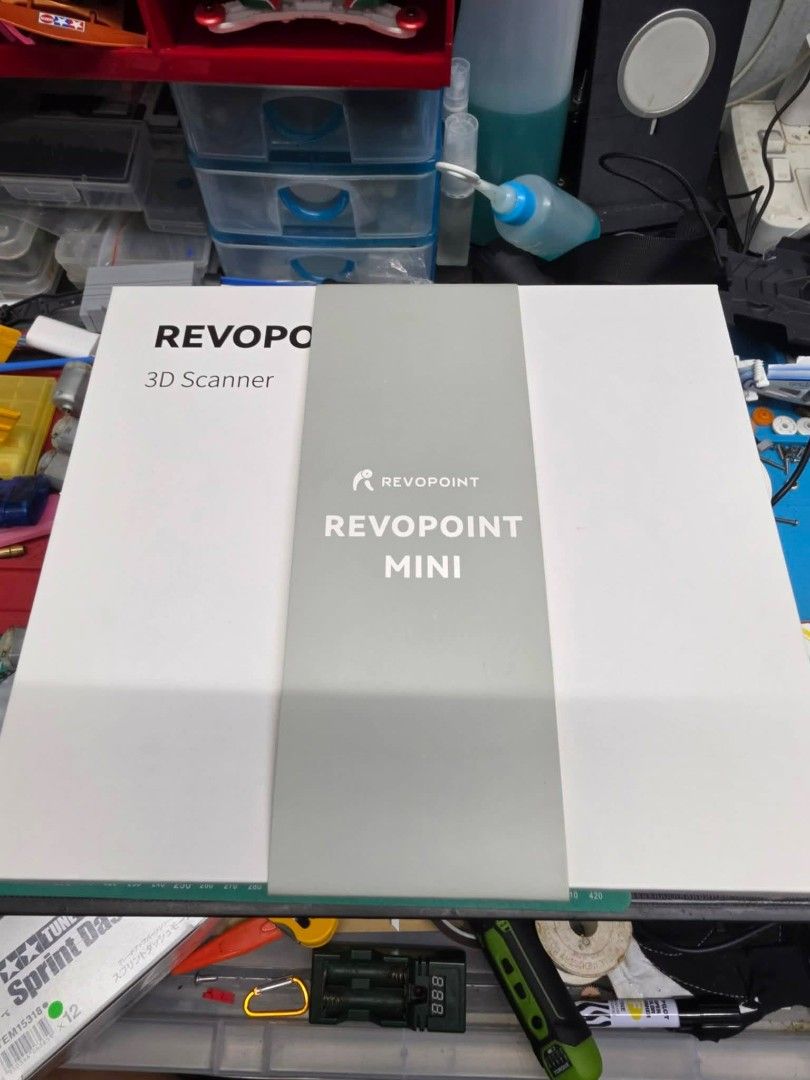 Revopoint Mini 3D Scanner (Category: Printers, Scanners & Copiers) located in Taguig. Submitted by sheila_cv (Listing ID 1465587223, Image 1). Description: PRICE IS NEGO - Item: Revopoint Mini 3D Scanner Kit - Condition: Complete with original packaging foam insert and box - Inclusions: Scanner unit, tripod stand, and all original cables - Ideal Use: High-precision scanning for small objects, miniatures, and detailed parts - Status: Ready for you
