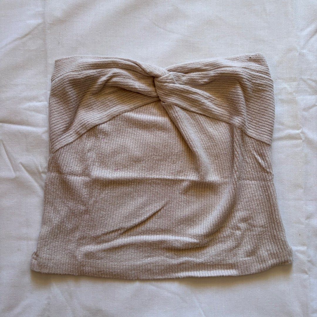 Ribbed Twist Front Tube Top Bundle (Category: Sleeveless) located in Calabanga. Submitted by vrncashane (Listing ID 1465694642, Image 1). Description: - Set of 2 basic tube tops (Beige and Sage Green) - Stylish front twist detail - Super stretchy and comfortable fabric - Great layering pieces for summer - Selling as a bundle.