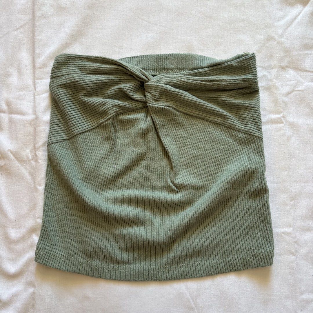 Ribbed Twist Front Tube Top Bundle (Category: Sleeveless) located in Calabanga. Submitted by vrncashane (Listing ID 1465694642, Image 2). Description: - Set of 2 basic tube tops (Beige and Sage Green) - Stylish front twist detail - Super stretchy and comfortable fabric - Great layering pieces for summer - Selling as a bundle.