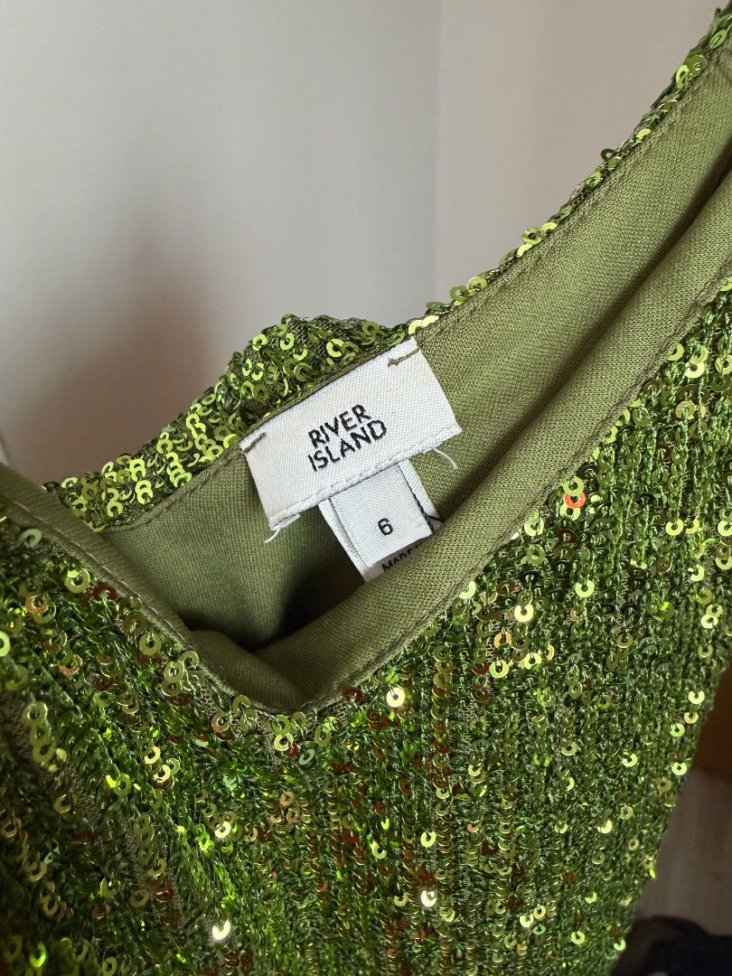 River Island Green Sequin Dress (Category: Dresses) located in Naic. Submitted by _ookaymnl (Listing ID 1465642480, Image 3). Description: - Brand: River Island - Size: UK/US 6 - Color: Green - Material/Design: Fully covered in shiny sequins with thin spaghetti straps and V-neckline - Occasion: Ideal for parties, clubs, and nights out.