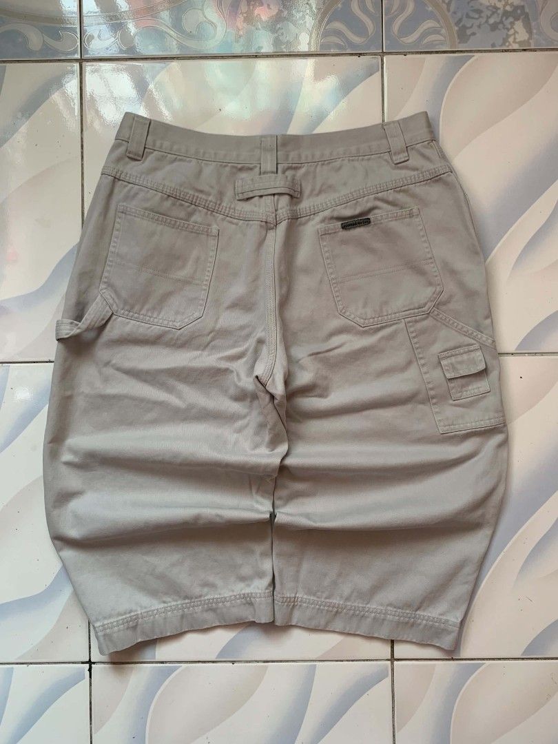 Riveted By Lee Carpenter Shorts Beige (Category: Shorts) located in Calamba. Submitted by glennkun192535 (Listing ID 1465627988, Image 2). Description: - Brand: Riveted By Lee - Color: Beige - Style: Classic carpenter utility shorts - Material: Heavy-duty cotton twill fabric - Features: Multiple pockets, hammer loop detail, branded button closure, and back pocket woven label - Fit/Occasion: Great streetwear staple for warm weather.