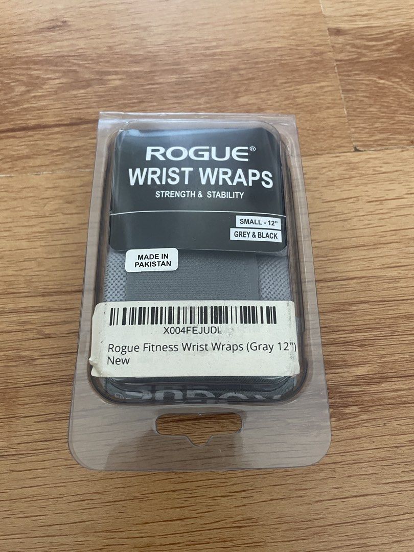 Rogue Wrist Wraps for Workout (Category: Toning & Stretching Accessories) located in Mandaluyong City. Submitted by zaiampiloquio (Listing ID 1465605630, Image 1). Description: - Brand: Rogue - Product: Wrist Wraps for Workout - Size & Color: Small (12"), Grey & Black - Condition: Brand new in original packaging - Features: Provides extra strength and stability for pressing, overhead lifts, weightlifting, powerlifting, and strongman training - Sp