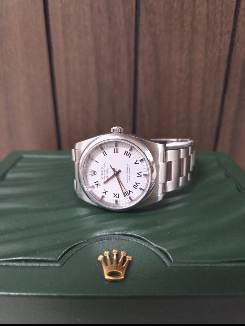 Rolex Airking 114200 White Roman Dial (Category: Watches) located in Singapore. Submitted by bakaberry (Listing ID 1465660470, Image 3). Description: Rolex AirKing 114200 White Roman Dial 34mm (looks like 36mm due to the lugs) Full set with box and papers Mint condition 2010 Model Bought it 6 months ago, lightly used Meet up Woodleigh, buangkok, bugis.