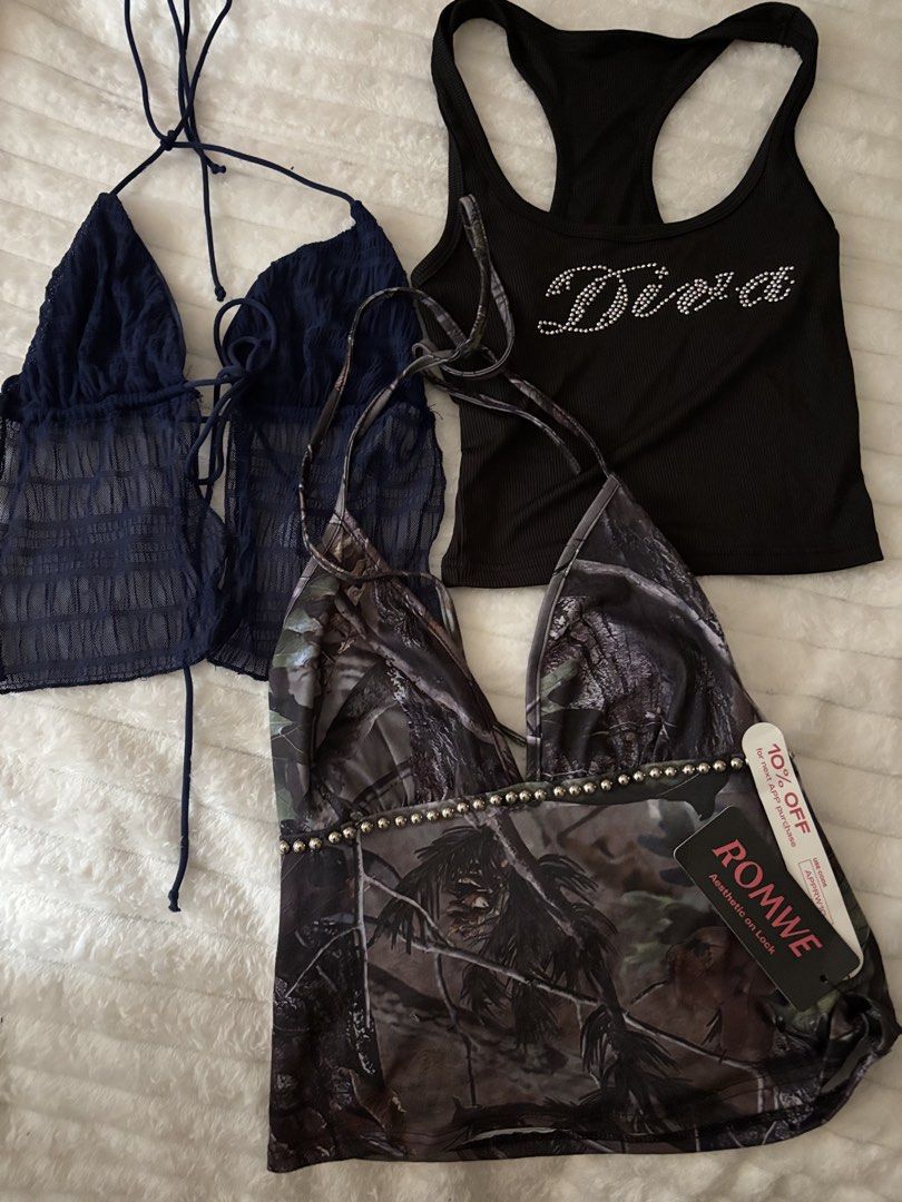 Romwe Camo Top & Two Halter Tops Bundle (Category: Sleeveless) located in Quezon City. Submitted by hadescloset (Listing ID 1465649702, Image 1). Description: - Can fit XS-M - Can negotiate the price 🛒 shop more to get more discounts and freebies! - Bundle of 3 trendy tops for going out or casual wear - Item 1: Romwe camo halter top with stud details (brand new with tags) - Item 2: Navy blue sheer mesh open-front halter top - Item 3: Black ribbe