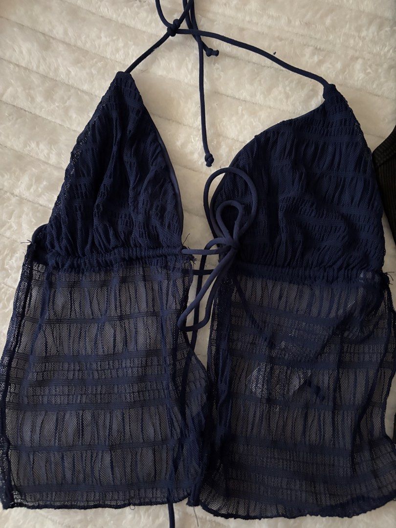 Romwe Camo Top & Two Halter Tops Bundle (Category: Sleeveless) located in Quezon City. Submitted by hadescloset (Listing ID 1465649702, Image 3). Description: - Can fit XS-M - Can negotiate the price 🛒 shop more to get more discounts and freebies! - Bundle of 3 trendy tops for going out or casual wear - Item 1: Romwe camo halter top with stud details (brand new with tags) - Item 2: Navy blue sheer mesh open-front halter top - Item 3: Black ribbe