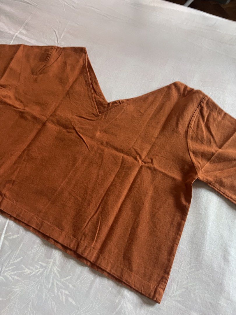 Rust orange V-neck linen top (Category: Shirts) located in Quezon City. Submitted by katedeclutter (Listing ID 1465591535, Image 2). Description: .