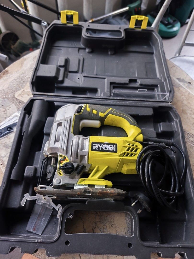 Ryobi Impact Drill with Case (Category: Construction Tools & Equipment) located in Tarlac. Submitted by ibrahimharb81 (Listing ID 1465721313, Image 3). Description: - Authentic Ryobi corded drill in a striking yellow and black colorway - Includes heavy-duty molded plastic carry case for easy storage and portability - Comes complete with a side handle for better control and stability - Textured grips designed for a secure, anti-slip hold during us