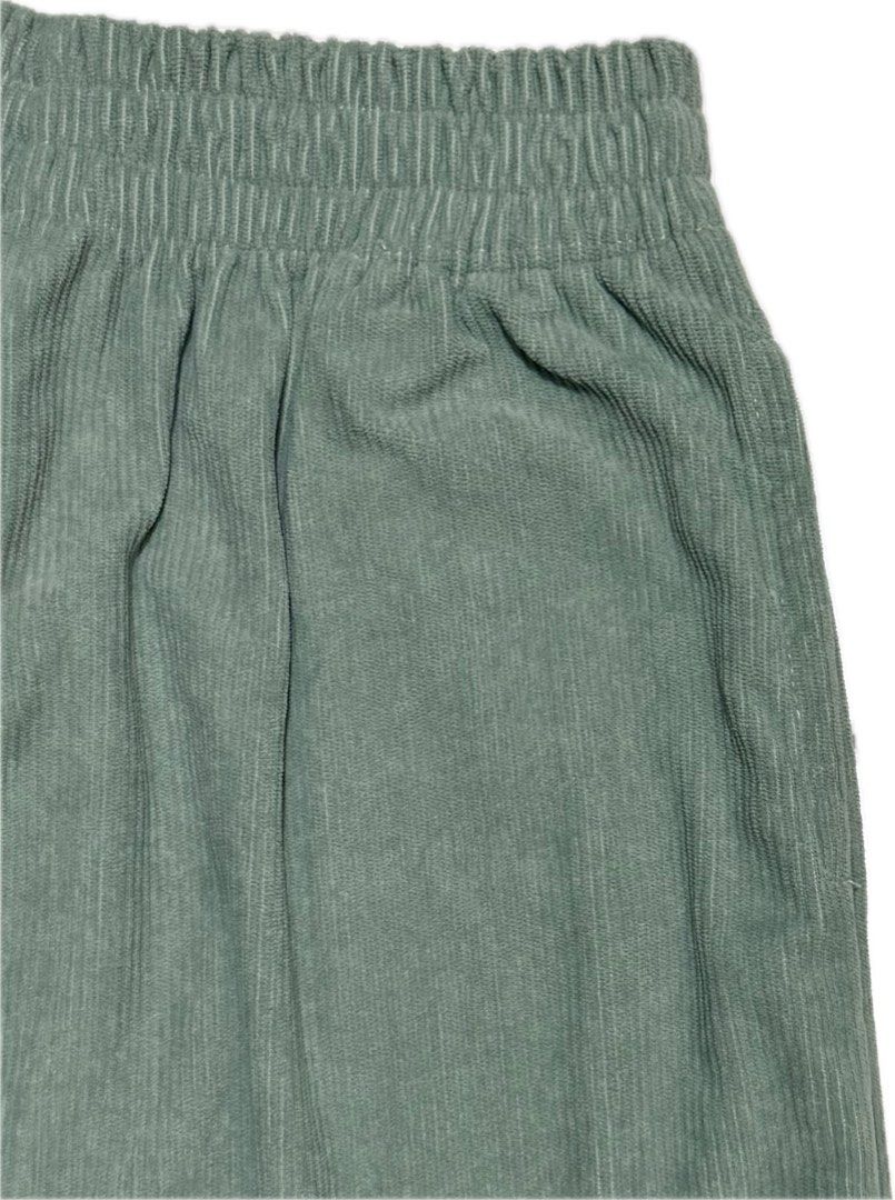 Sage Green Corduroy Pants (Category: Jeans) located in Quezon City. Submitted by ashIeigh (Listing ID 1465724184, Image 2). Description: - Color: Sage Green - Material: Soft textured corduroy - Fit: Relaxed straight leg with stretchy elastic waist.