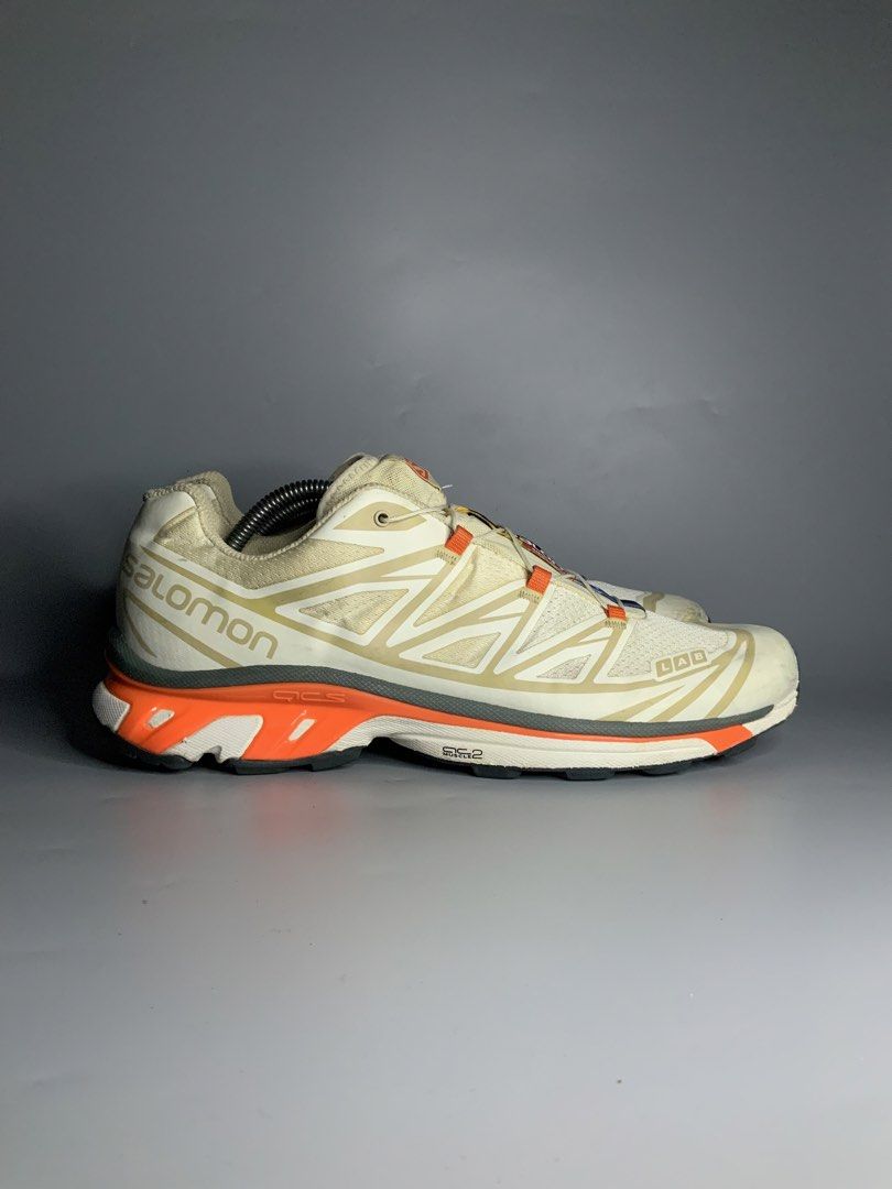 Salomon XT-6 (Category: Sneakers) located in Cavite. Submitted by kalye_footwear (Listing ID 1465713571, Image 1). Description: - Brand: SalomonXT-6 - Model: S-Lab XT-6 Soft Ground - Size: Us 10.5 , Euro 44.5 , Cm 28.5 - Colorway: White and off-white upper with vibrant orange, grey, blue, and yellow accents - Features: Quicklace system and S-Lab XT-6 heel branding - Condition: Excellent Lugs condition, minor scuffs and marks on the toe caps .