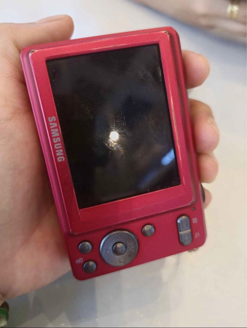 Samsung Pink 12.2 Megapixels Digital Camera (Category: Cameras) located in Makati City. Submitted by kawaii_happyfinds (Listing ID 1465622084, Image 2). Description: - Model: Samsung Point & Shoot Digital Camera - Color: Vibrant Pink (super trendy Y2K aesthetic!) - Resolution: 12.2 Megapixels for crisp, nostalgic shots - Lens: Samsung 3x Optical Zoom (6.3-18.9mm) - Features: Built-in flash, rear LCD screen, and easy-to-use standard controls - Siz