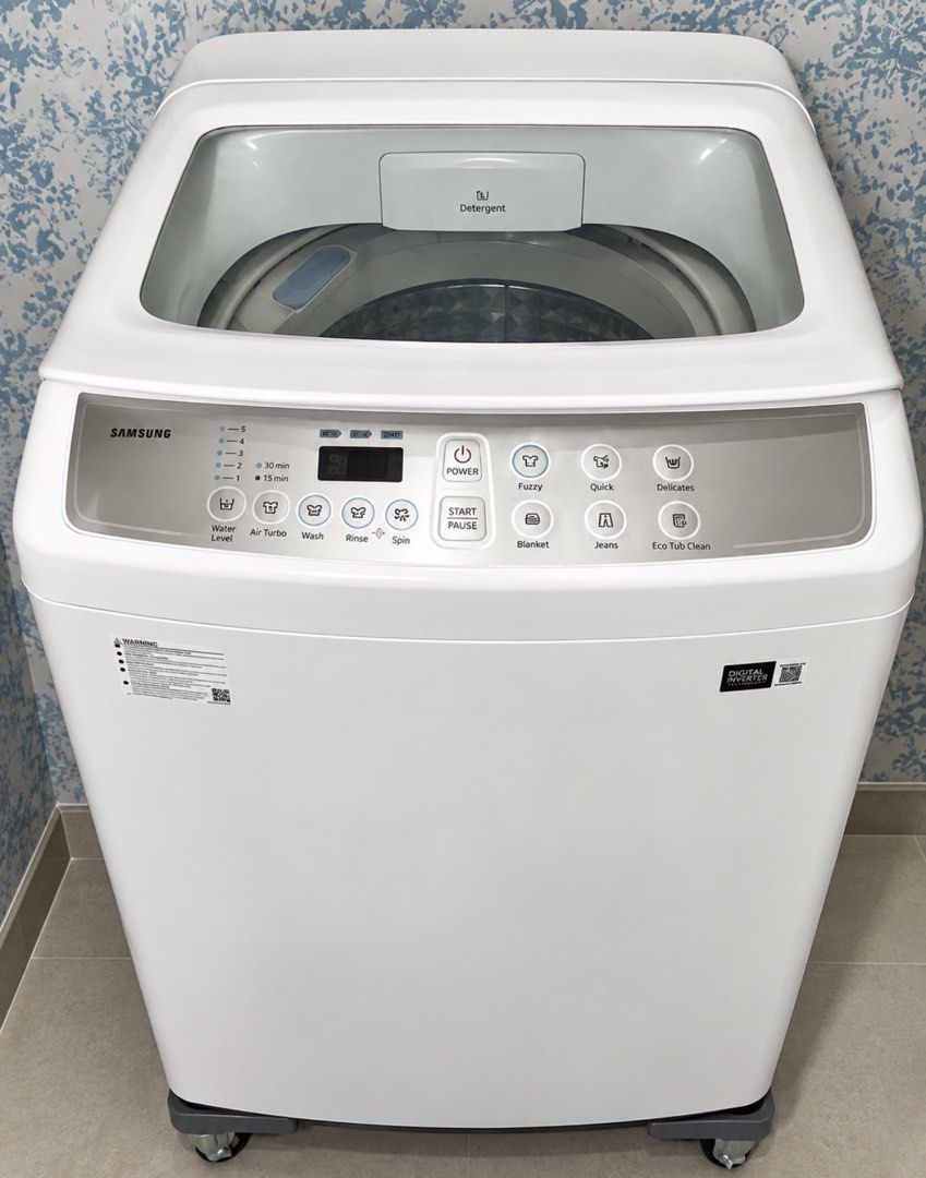 Samsung Top Load Washing Machine (Category: Washing Machines and Dryers) located in Cavite. Submitted by thinkpositive_ (Listing ID 1465601712, Image 1). Description: - Brand: Samsung White Top Load Washing Machine - Motor: Energy-saving Digital Inverter Motor - Display & Controls: Digital LED display with multiple cycle options (Fuzzy, Quick, Delicates, Blanket, Jeans, Eco Tub Clean) - Features: Clear glass lid, integrated detergent dispenser, a