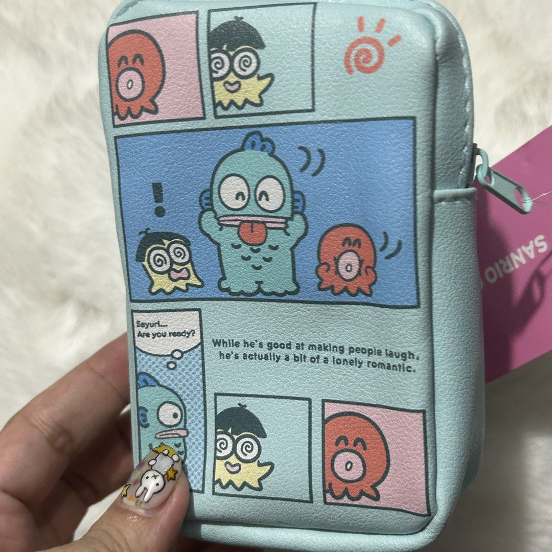 Sanrio Hangyodon Pouch (Category: Purses & Pouches) located in Quezon City. Submitted by kitsune.treasures (Listing ID 1465660810, Image 3). Description: *First to pay policy! *1 day reservation only. Failure to pay on time, auto cancel. 📍Quezon City * MOD: J&T | Lalamove * MOP: GCASH | BPI 📦ON HAND AND READY TO SHIP! CONDITION: WHAT YOU SEE IS WHAT YOU GET. Dimensions: Kindly check the photos for the actual measurements. Please check all the p