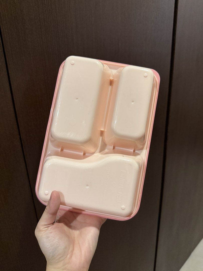 Sanrio Hello Kitty Bento Lunch Box 3 Compartment (Category: Food Organization & Storage) located in Manila. Submitted by onlinegarageph (Listing ID 1465716797, Image 3). Description: - Authentic Sanrio Kitty design featuring cute strawberry graphics - Colorway: Charming pink lid with a cream beige base - Capacity: Generous 1100ml, ideal for meal prep, school, or work lunches - Functionality: 3-compartment interior keeps your food nicely separated