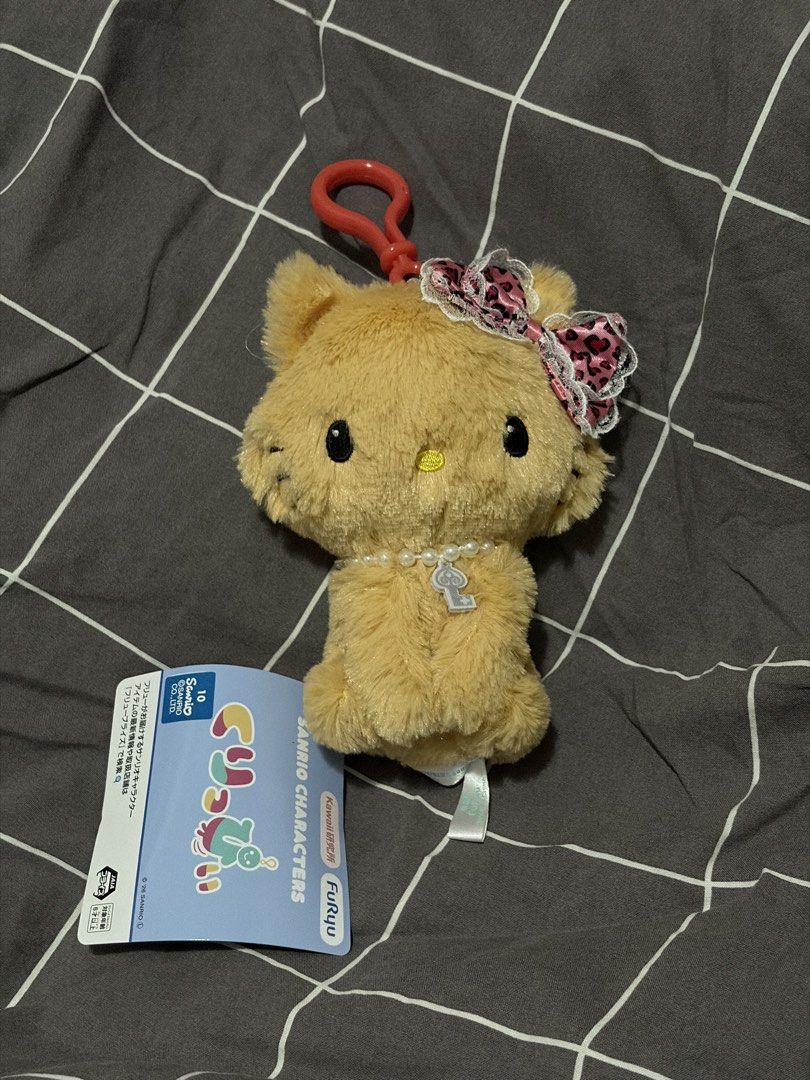 Sanrio Tan Hello Kitty Charmmy Kitty keychain Plush (Category: Plushies & Soft Toys) located in Makati City. Submitted by mygyunki (Listing ID 1465737299, Image 1). Description: .