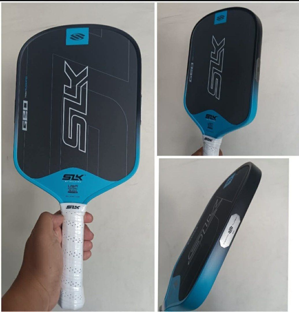 Selkirk SLK Geo Pickleball Paddle (Category: Racket and Ball Sports) located in Quezon City. Submitted by pickleballpaddle (Listing ID 1465624038, Image 3). Description: - Brand: Selkirk SLK Geo Pickleball Paddle - Color: Sleek black with bright green trim - Condition: Brand new (plastic still intact on the white wrapped handle) - Performance: Elongated shape with a textured face for maximum spin - Dimensions: Standard size (marked on the side) -