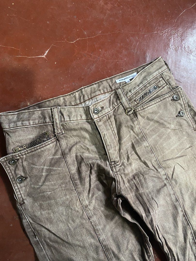 semantic design distressed brown denim jeans size LL (Category: Jeans) located in Laguindingan. Submitted by purto_nato42 (Listing ID 1465729897, Image 2). Description: - Brand/Style: Semantic Design Japanese streetwear aesthetic brown denim jeans - Size: LL (100% cotton) - Design: Unique paneled seam construction with a cool distressed wash - Closure: Classic button fly - Details: Eye-catching patterned pocket trim on both front and back pockets