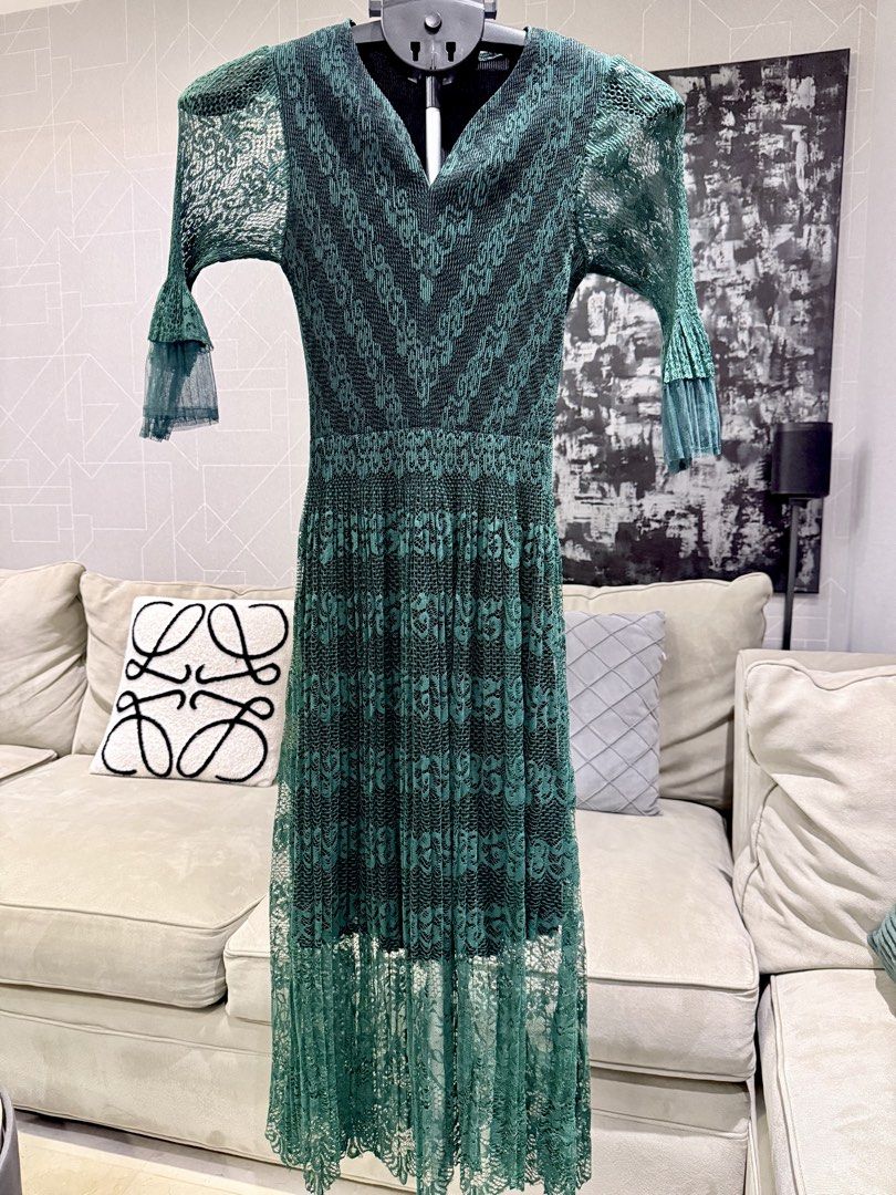 Sheer dark green patterned pleated lace dress (Category: Dresses) located in Taguig. Submitted by annebydesign (Listing ID 1465695793, Image 3). Description: Hi all. Selling this Sheer dark green patterned pleated lace dress for ₱500- super stretchy •Like new. Bought in IG •Fits small to medium •With inner lining. Intricate pleated lace •All parts of the dress. Arm- waist- chest all stretches Loc: Taguig BGC Mop: GCash/ Bank transfer/ COD Mod: Co