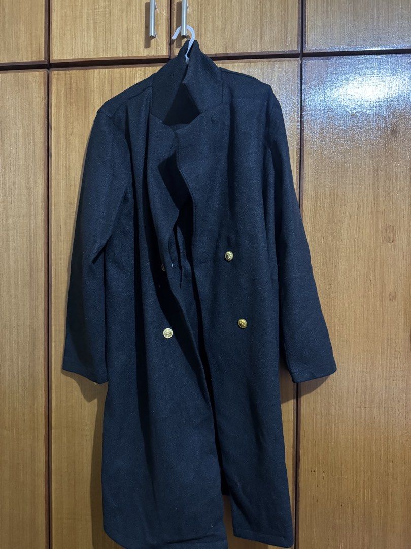 Shein Black Double-Breasted Long Coat Size L (Category: Coats, Jackets and Outerwear) located in Santa Cruz, Pampanga. Submitted by eygee_rp (Listing ID 1465725552, Image 1). Description: - Brand: Shein - Size: L (tag attached) - Color: Classic Black - Style: Double-breasted long coat with lapel collar - Details: Chic gold-tone front buttons and textured weave fabric - Condition: Clean inside and out, perfect layering piece for the cooler weather