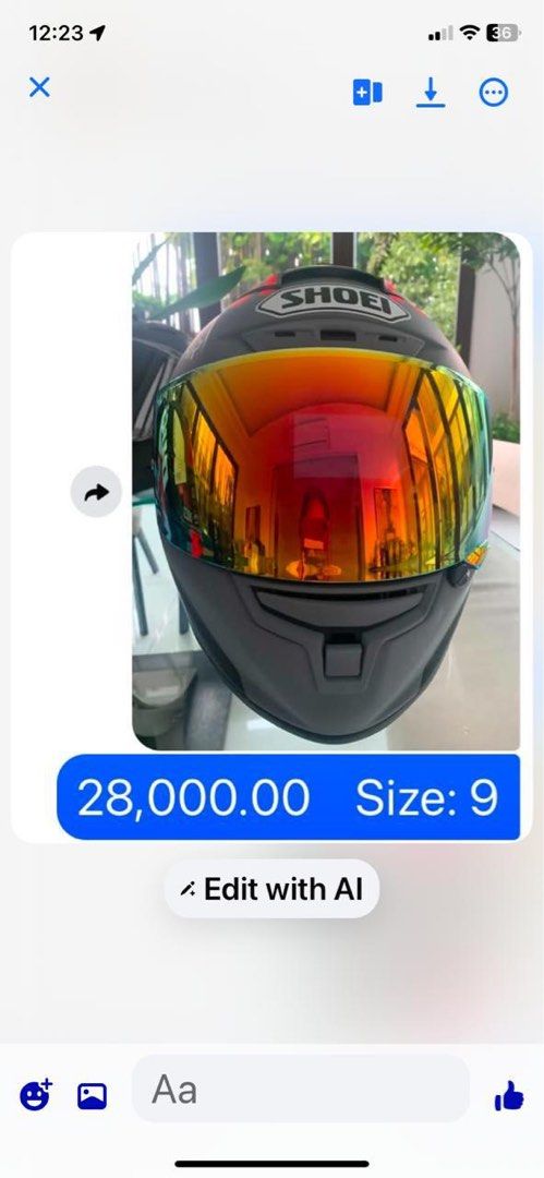 Shoei Matte Black Motorcycle Helmet with Rainbow Visor (Category: Caps & Hats) located in Pasig City. Submitted by cormatzu (Listing ID 1465655104, Image 1). Description: - Brand: Shoei - Size: XL - Color: Matte Black - Visor: Vibrant rainbow iridium - Design: Sleek, aerodynamic shell with top ventilation port - Closure: Secure chin strap mechanism - Condition: Minor signs of handling on the exterior; interior padding is clean and intact - Ideal 