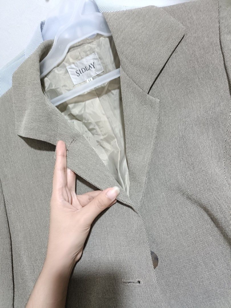 SIDLAY blazer taupe beige (Category: Coats, Jackets and Outerwear) located in Taguig. Submitted by vm.co (Listing ID 1465715766, Image 3). Description: WRINKLE-RESISTANT CREPE SUITING FABRIC Smooth, lightweight woven fabric with a subtle crepe texture. Structured enough for a blazer but comfortable and easy to wear. Not prone to wrinkles..