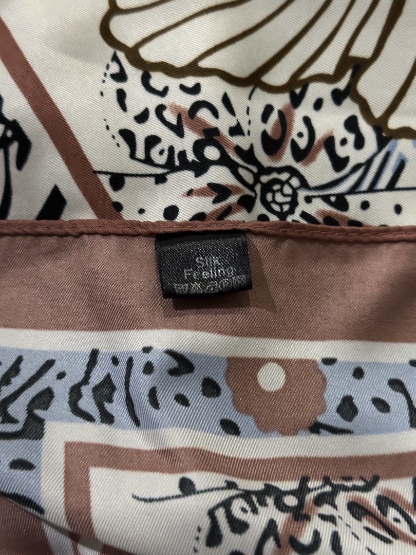 Silk Floral Square Scarf (Category: Scarves) located in Quezon City. Submitted by gentle_leirozay (Listing ID 1465650129, Image 2). Description: Washed once, never used Original price: ₱138.