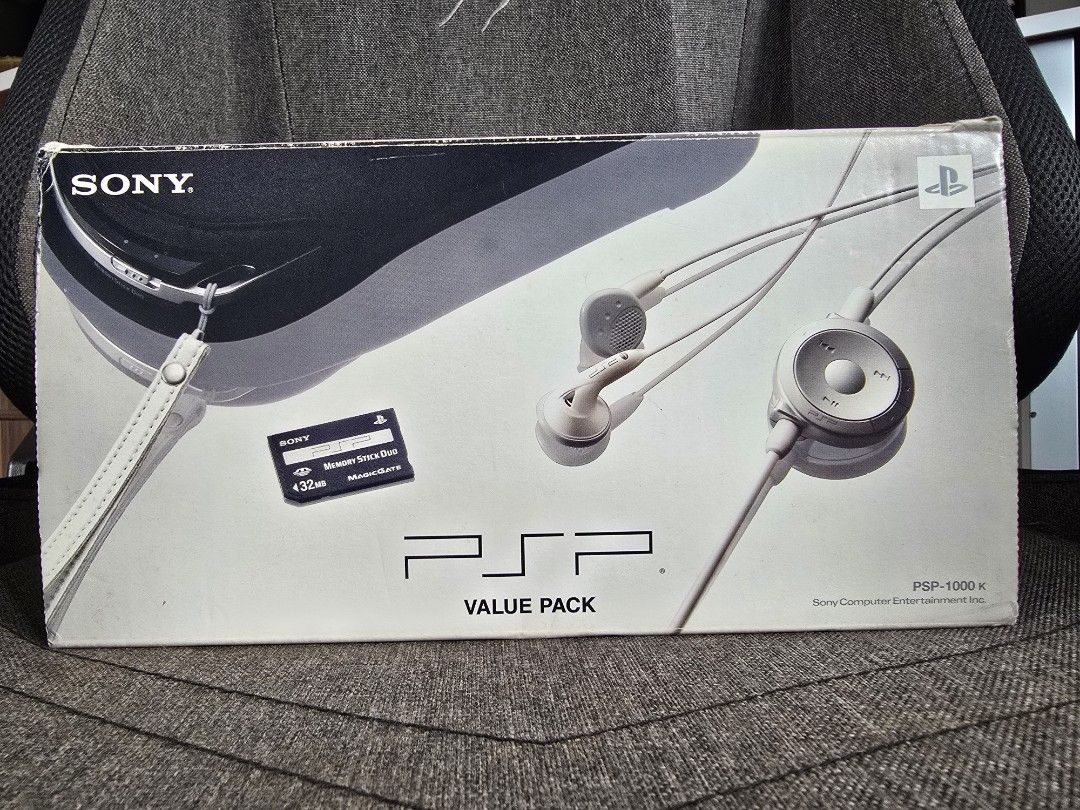 Sony PSP 1000 Value Pack (Category: PlayStation) located in Paranaque City. Submitted by r3tr0_n3m3sis (Listing ID 1465595809, Image 2). Description: Sony Playstation Portable Black from Japan Inclusion: - Sony PlayStation Portable Black - Sony AC Adaptor - User Manual and Box - Free Sony Memory Stick Duo 32mb - 16GB SanDisk SD Card w/ Memory Adaptor - PSP Crystal Case - Sony PSP Headset with remote control - Loaded with Popular Games - Firmware 