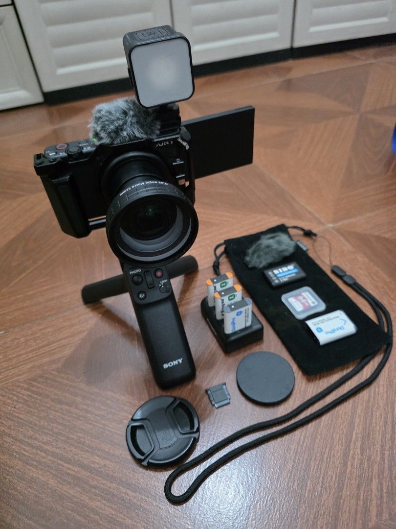 SONY ZV-1 Vlogging Set (Category: Cameras) located in Manila. Submitted by everyallmustgo (Listing ID 1465742876, Image 1). Description: 1. Sony ZV-1 set Sony ZV-1 SmallRig cage Sony GP-VPT2BT shooting grip extra batteries battery charger 64GB SD card lense small light.