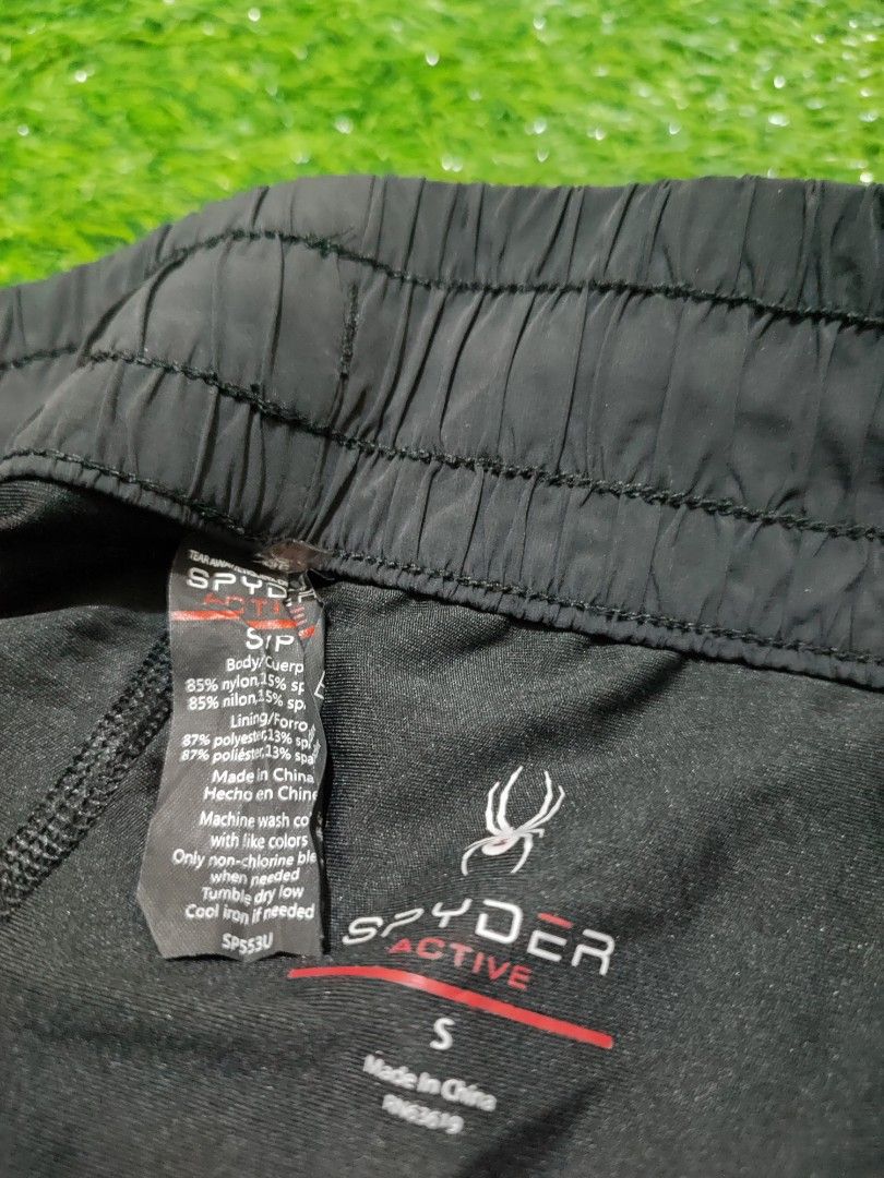 Spyder Black Athletic 2n1 Running Shorts (Category: Activewear) located in Cebu City. Submitted by deadjay84 (Listing ID 1465674001, Image 3). Description: - Brand: Spyder - Color: Classic Black - Size: Small on tag - Design: Double-layer style with built-in inner short and lightweight outer shell - Fit: Elastic waistband with adjustable drawstring cords - Storage: Convenient side pockets - Details: Small Spyder brand logo printed on the back - B
