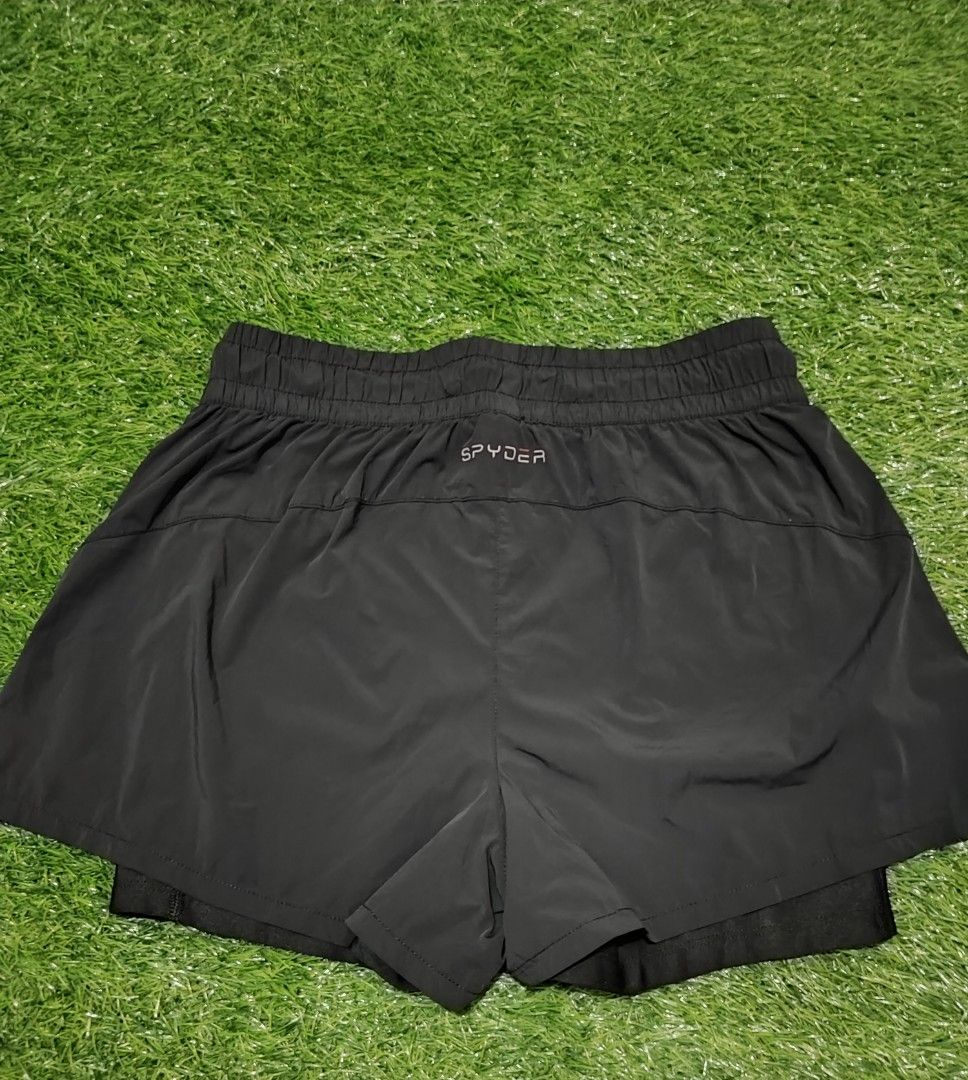 Spyder Black Athletic 2n1 Running Shorts (Category: Activewear) located in Cebu City. Submitted by deadjay84 (Listing ID 1465674001, Image 2). Description: - Brand: Spyder - Color: Classic Black - Size: Small on tag - Design: Double-layer style with built-in inner short and lightweight outer shell - Fit: Elastic waistband with adjustable drawstring cords - Storage: Convenient side pockets - Details: Small Spyder brand logo printed on the back - B