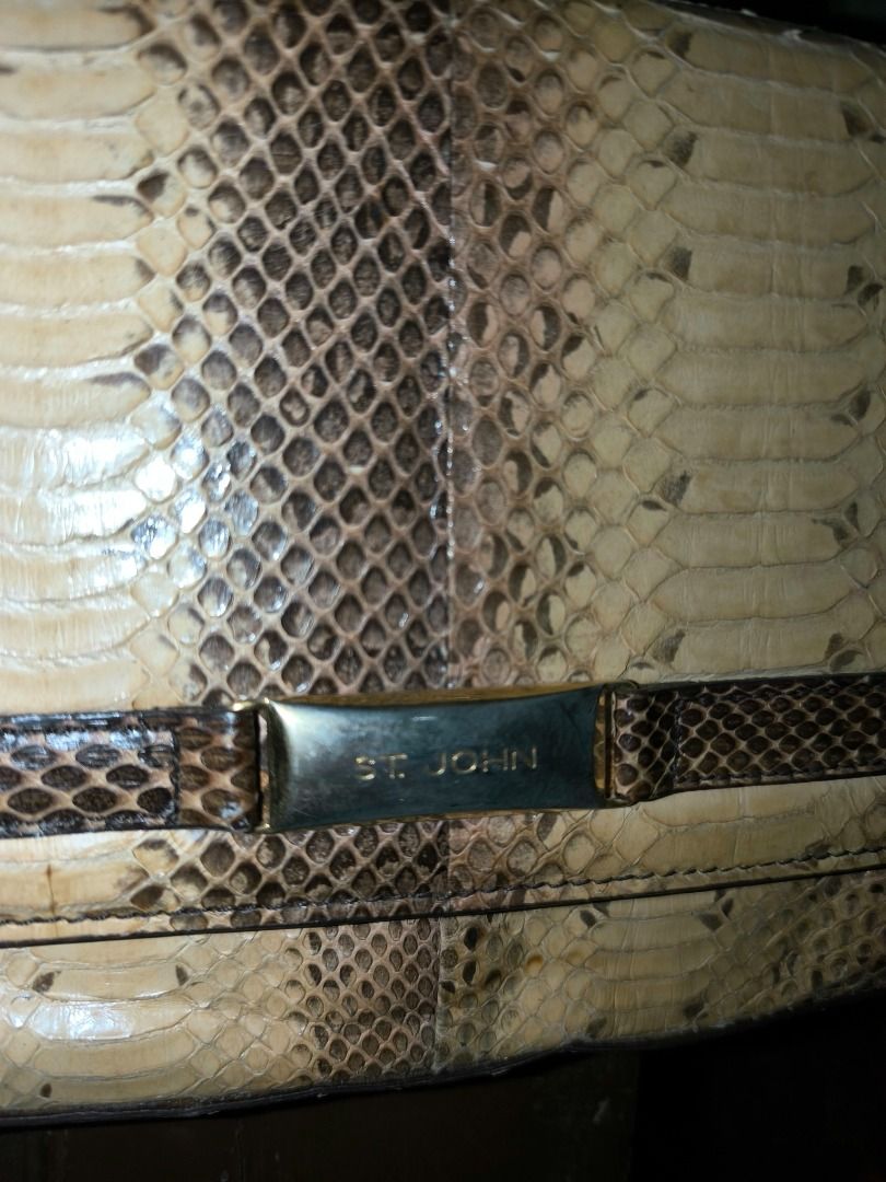 St. John Snakeskin Print Shoulder Bag (Category: Luxury Bags & Wallets) located in Cagayan de Oro. Submitted by fastforest_9c3962 (Listing ID 1465733530, Image 2). Description: - Rare, 100% authentic St. John Couture East-West Baguette Bag. - Trendy snakeskin print in versatile cream and brown tones - Structured rectangular shape with a secure front flap closure - Features a chic metallic hardware accent with the brand name - Comfortable medium-l