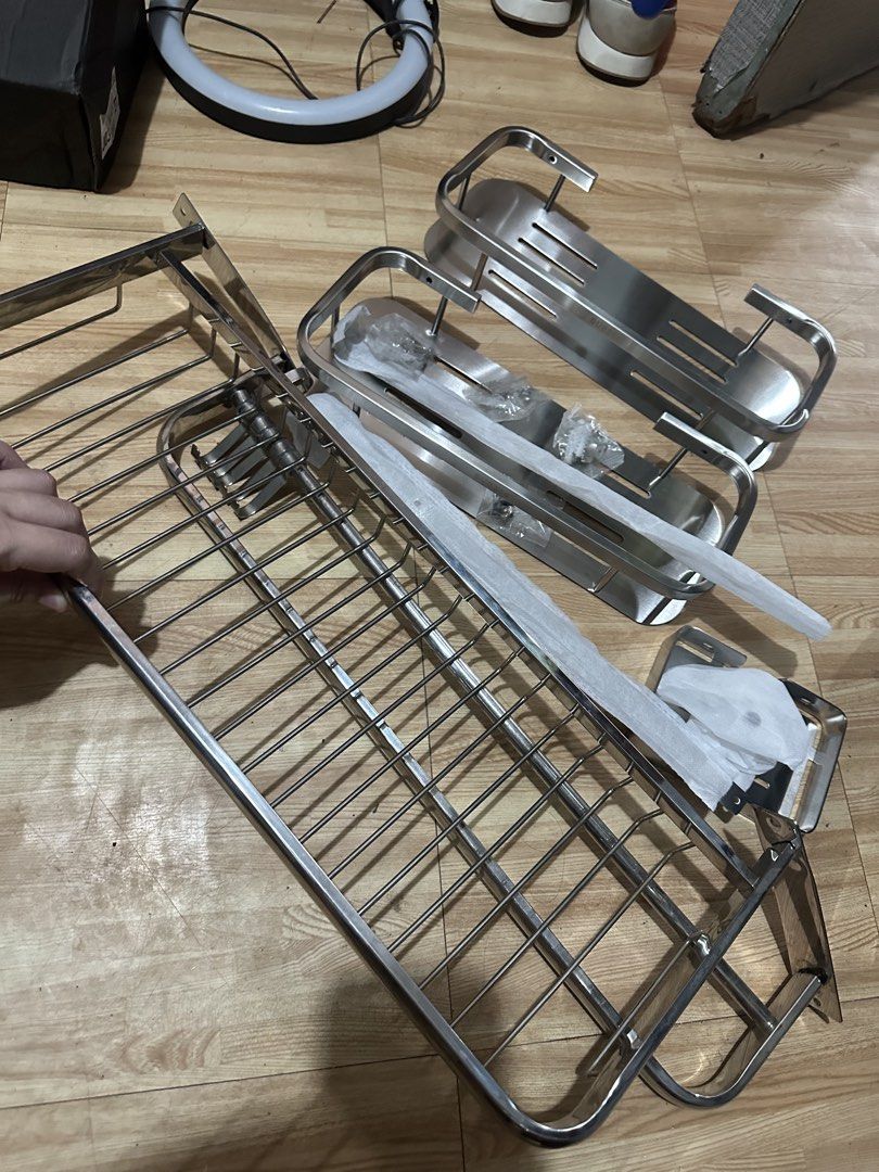 Stainless Steel Bathroom Storage Shelves Set (Category: Bathroom & Kitchen Fixtures) located in San Pedro. Submitted by claire7818 (Listing ID 1465633154, Image 2). Description: - Complete Set: Includes 2 solid rectangular shelves with drainage slots and 1 large wire basket. - Rust-Resistant & Durable: Made of high-quality stainless steel, perfect for wet areas like the shower or kitchen. - Multi-Purpose: Great for organizing shampoo, soap, bath 