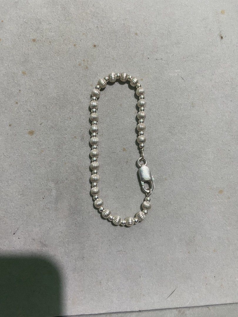 Sterling silver 925 beaded bracelet featuring textured ribbed round beads (Category: Jewelry) located in Binan City. Submitted by retroz_collections (Listing ID 1465744814, Image 1). Description: 7.5 inches length x 4mm width.